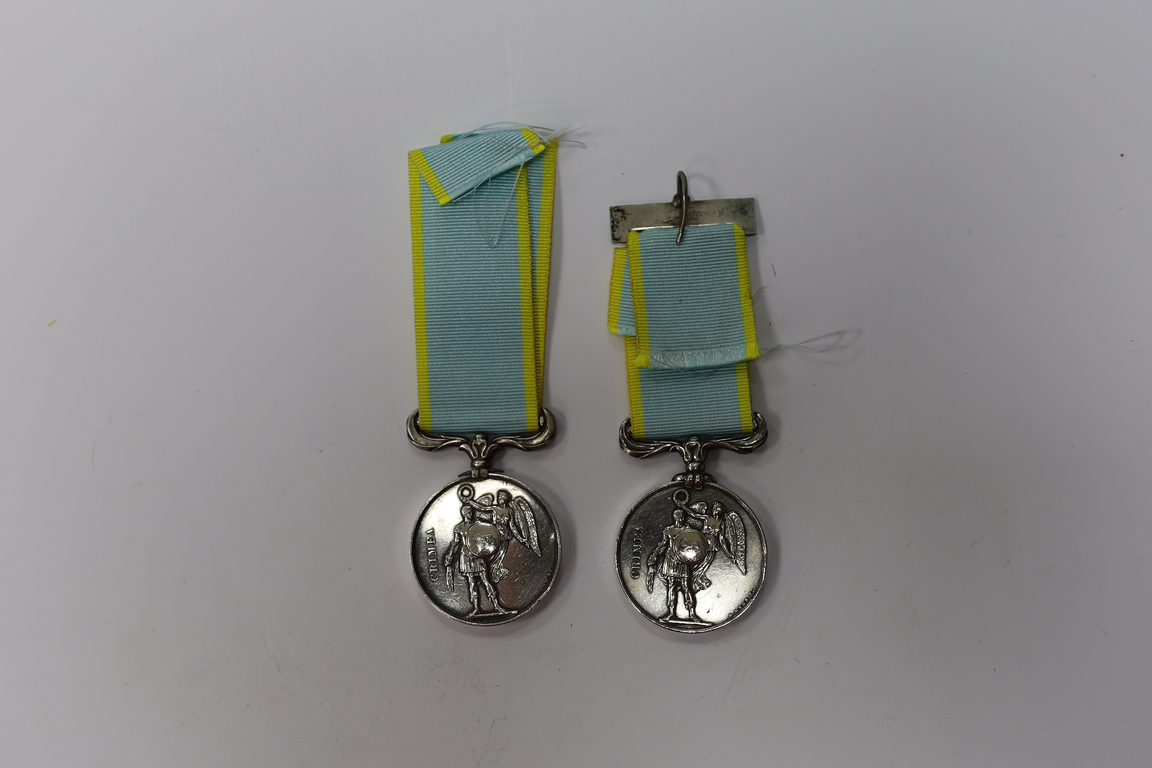 Two Crimea medals, one with Inkermann clasp, both unnamed as issued